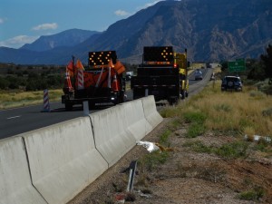 A semitruck lies on its side straddling a culvert near the Toquerville Exit on Interstate 15 northbound, Toquerville, Utah, July 22, 2015 | Photo by Julie Applegate, St. George News