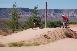 Connor and Lance Clifford zip around the track at the Virgin BMX Track, Virgin, Utah, July 13, 2015 | Photo by Hollie Reina, St. George News