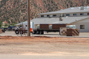 A truckload of blocks is delivered to build a wall around the Leroy S. Johnson Meeting House, Colorado City, Arizona, July 2, 2015 | Photo by Nataly Burdick, St. George News