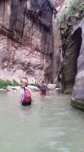 L-R Hollie Reina and Kathleen Berglund wade through the Virgin River on The Narrows hike in Zion National Park, Utah, July 1, 2015 | Photo by Cami Meinkey, St. George News