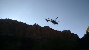 A Classic Lifeguard helicopter carries an injured woman to the hospital, Water Canyon, near Hildale, Utah, July 28, 2015 | Photo courtesy of Washington County Search and Rescue, St. George News