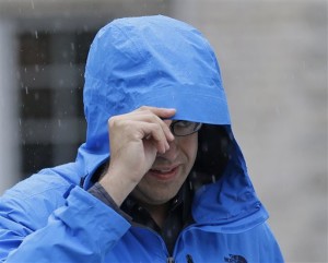 Subway restaurant spokesman Jared Fogle walks to a waiting car as he leaves his home, Tuesday, July 7, 2015, in Zionsville, Ind. FBI agents and Indiana State Police have removed electronics from the property. FBI Special agent Wendy Osborne said that the FBI was conducting an investigation in the Zionsville area but wouldn't confirm it involved Fogle, Zionville, Indiana, July 7, 3015 | AP Photo by Michael Conroy, St. George News