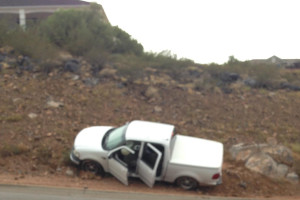 A driver lost control of his truck and ran into a ridge on Foremaster Drive, July 18, 2015, St. George, Utah | Photo by Brittney Chubbs, St. George News