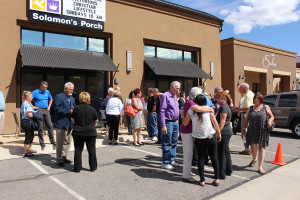 Members and friends of the Solomon's Porch church mingle during the ribbon cutting ceremony, St. George, Utah, July 9, 2015 | Photo by Nataly Burdick, St. George News