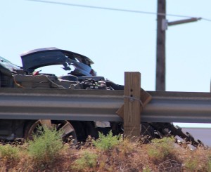 A Mustang sits wrecked on the shoulder of Interstate 15, Washington, Utah, August 13, 2015 | Photo by Ric Wayman, St. George News