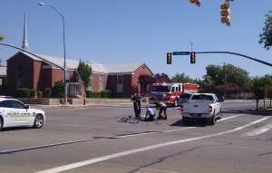 A bicyclist was injured Friday after he ran a red light and was clipped by a car, St. George, Utah, Aug. 28, 2015 | Photo courtesy of Amy Palmer, St. George News