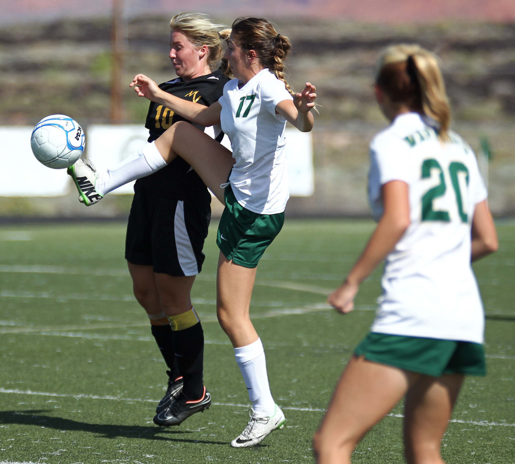 Emily Hafen (17) fights for a loose ball for Snow Canyon, Snow Canyon vs. Mountain View, Girls Soccer, St. George, Utah, Aug. 15, 2015, | Photo by Robert Hoppie, ASPpix.com, St. George News