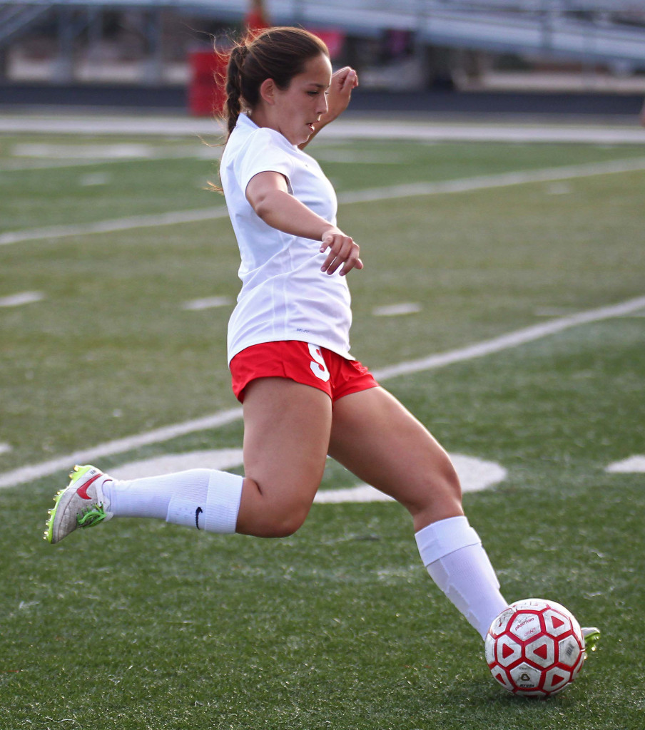 Shanel Stevens (9) passes the ball to a teammate, Hurricane vs. Beaver, Girls Soccer, St. George, Utah, Aug. 27, 2015, | Photo by Robert Hoppie, ASPpix.com, St. George News