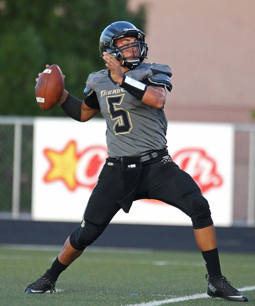 Desert Hills quarterback Nick Warmly (5) makes a throw, Desert Hills vs. Foothill Nev., Football, St. George, Utah, Aug. 28, 2015, | Photo by Robert Hoppie, ASPpix.com, St. George News