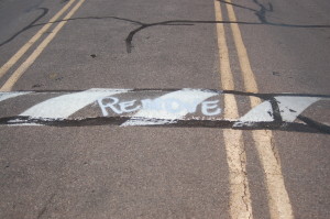 Speed bumps marked "remove" located at the south entrance of Snow Canyon State Park, Ivins, Utah, Aug. 24, 2015 | Photo by Hollie Reina, St. George News