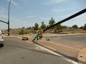 A man was transported to the hospital after falling asleep and crashing his car into a traffic signal pole at 2260 West State Street, causing it to fall over, Hurricane, Utah, Aug. 19, 2015 | Photo courtesy of the Hurricane City Police Department, St. George News