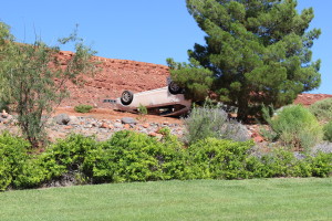 One vehicle rolls and another flips after a Dodge truck collides with a Toyota hybrid on Snow Canyon Parkway, St. George, Utah, Aug. 8, 2015 | Photo by Jessica Tempfer, St. George News