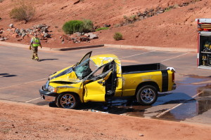 Two vehicles rolled after a Dodge truck collided with a Toyota Hybrid. St. George, Utah, Aug. 8, 2015 | Photo by Jessica Tempfer