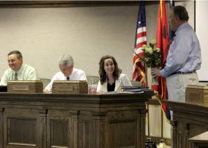 Councilman Don Marchant presents Mayor Maile Wilson with happy birthday roses, Cedar City Council Chambers, Cedar City, Utah, August 20, 2015 | Photo by Carin Miller, St. George News