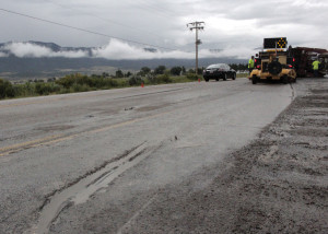 Slide gauges in the road from the well service pump truck, Minersville Highway and Midvalley Rd., Enoch, Utah, August 26, 2015 | Photo by Carin Miller, St. George News