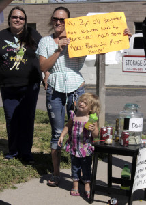 Residents gather in protest of what they call "slum lord" living conditions, Mammoth Mobile Estates, Cedar City, Utah, August 28, 2015 | Photo by Carin Miller, St. George News