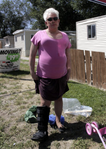 Dorothy Draper shows the boot she now wears as a result of negligence on behalf of the homeowners she said, Mammoth Mobile Estates, Cedar City, Utah, August 28, 2015 | Photo by Carin Miller, St. George News