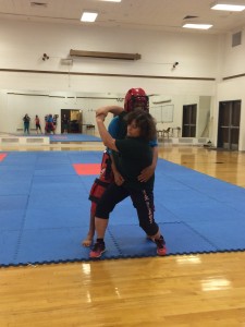 Student Brenda Jensen with instructor Tim Eicher in the gym portion of the personal safety course, St. George, Utah, undated | Photo courtesy of the Dove Center, St. George News