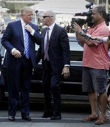 Donald Trump arrives for jury duty in New York, Monday, Aug. 17, 2015. Trump was due to report for jury duty Monday in Manhattan. The front-runner said last week before a rally in New Hampshire that he would willingly take a break from the campaign trail to answer the summons. | AP Photo by Richard Drew, St. George News