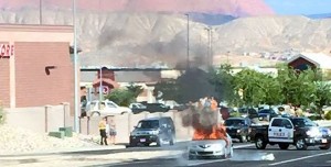 A Mazda 3 went up in flames while traveling on Green Springs Drive, Washington, Utah, Aug. 9, 2015 | Photo courtesy of Collette Williams, St. George News