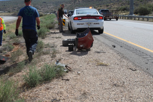 Items from a crashed  Hyundai lay in the road after the driver swerved to miss another vehicle and rolled the vehicle twice, Toquerville, Utah, August 13, 2015 | Photo by Nataly Burdick, St. George News