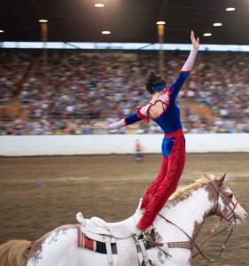 Trick rider stands on a horse, location and date unspecified | Photo courtesy of Cherry Creek Radio, St. George News