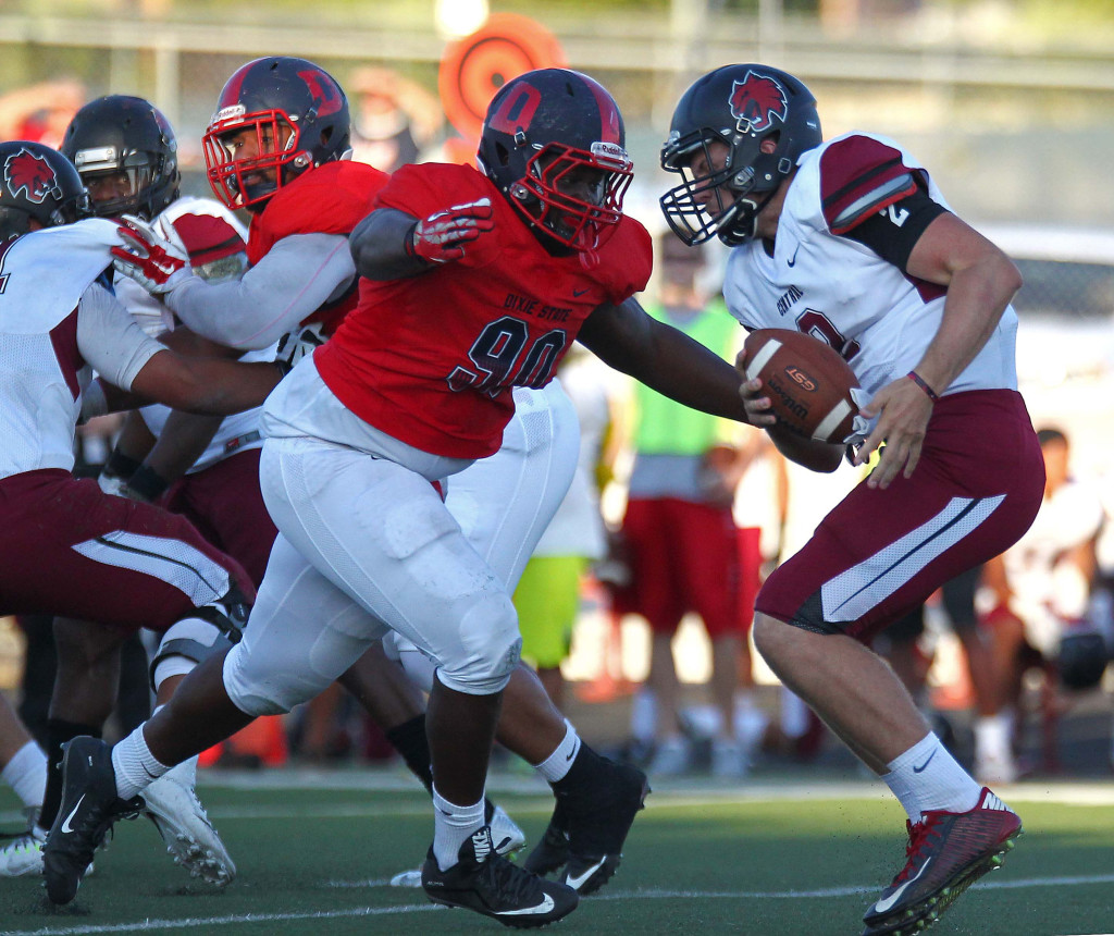 Dixie State defender Chris Campbell (90) sacks the Central Washington quarterback, Dixie State University vs. Central Washington University, St. George, Utah, Sept. 10, 2015, | Photo by Robert Hoppie, ASPpix.com, St. George News