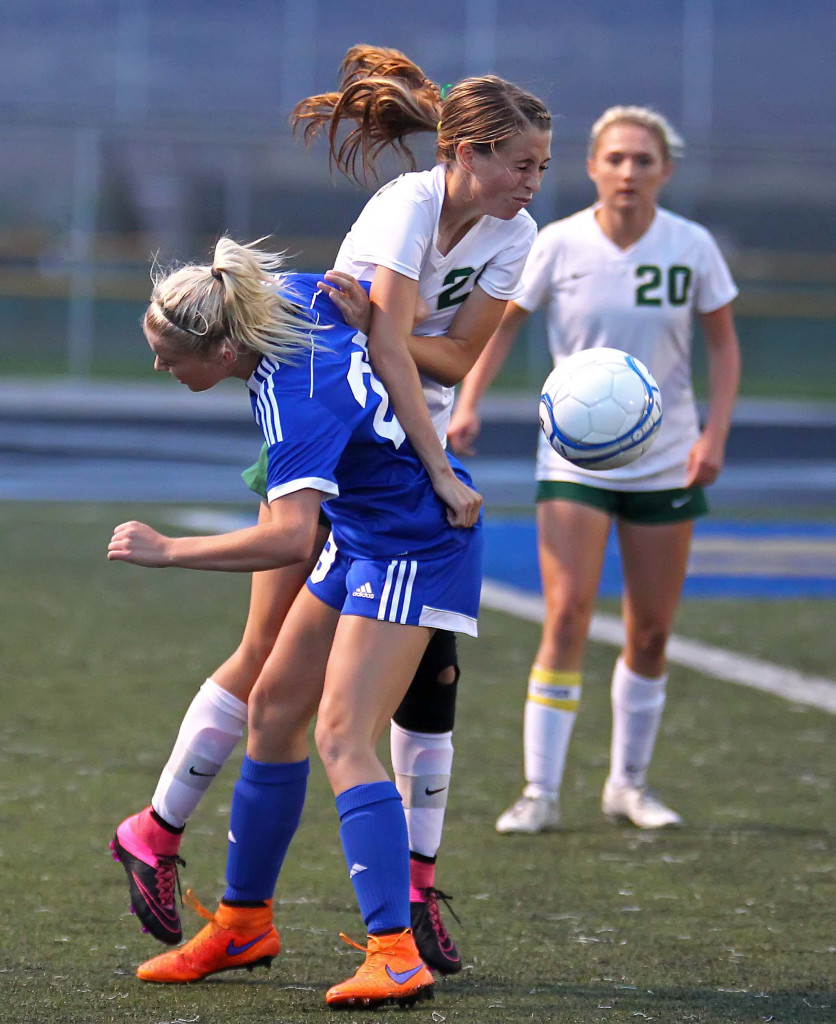 Snow Canyon's Sarah Evans (22) and Dixie's Kennedy Warnick (23) battle for a loose ball, Snow Canyon vs. Dixie, Girls Soccer, St. George, Utah, Sept. 15, 2015, | Photo by Robert Hoppie, ASPpix.com, St. George News