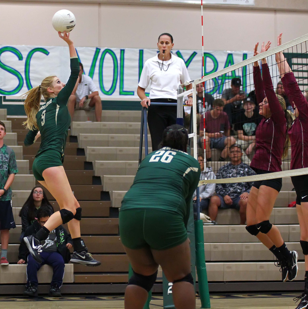 Nikenna Durante tips a ball over the net for Snow Canyon, Snow Canyon vs. Pine View, Volleyball, St. George, Utah, Sept. 15, 2015, | Photo by Robert Hoppie, ASPpix.com, St. George News