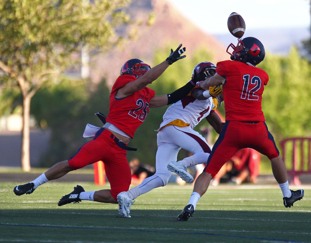 Dixie State defenders Colton Olson (12) and Garret Hutnick (25) break up a pass in this file photo from Dixie State University vs. Colorado Mesa University, Football, St. George, Utah, Sept. 5, 2015, | Photo by Robert Hoppie, ASPpix.com, St. George News