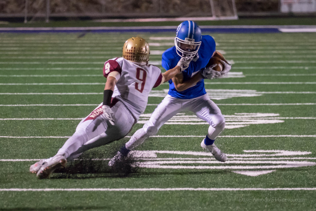Jaden Harrison makes a move Friday night, Cedar at Dixie, St. George, Utah, Sept. 18, 2015 | Photo by Dave Amodt, St. George News