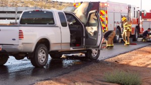 Firefighters douse a natural gas truck that caught fire on Cottonwood Springs Road Tuesday afternoon, St. George, Utah, Sept. 29, 2015 | Photo by Julie Applegate, St. George News