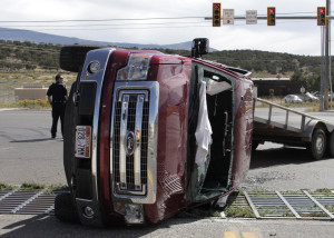 A woman is sent to the hospital following a three-vehicle accident at Highway 56 and Lund Road, Cedar City, Utah, Sept. 26, 2015 | Photo by Carin Miller, St. George News