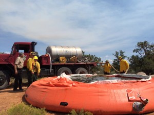 Firefighters prepare pool of water to be dumped on a fire near Pine Valley Mountain, Washington County, Utah, Sept. 8, 2015 | Photo by Mori Kessler, St. George News 