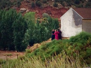 Residents of Hildale, Utah, watch as search crews continued Tuesday to go through the area in search of bodies and survivors in the wake of Monday’s fatal flash flooding in Hildale. As of Tuesday night, 12 bodies were recovered, 3 children survived, and 1 boy remained missing. Hildale, Utah, Sept. 15, 2015 | Photo by Kimberly Scott, St. George News