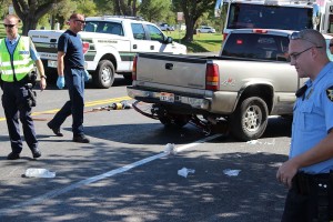 A bicycle is clearly visible under a pickup truck at the scene of an accident across from the cemetery Friday, St. George, Utah, September 25, 2015 | Photo by Ric Wayman, St. George News