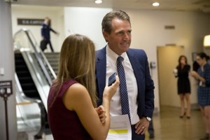 Sen. Jeff Flake, R-Ariz. speaks with a reporter after voting yes for a Senate approved stopgap spending bill to avert a government shutdown. The vote now goes to the House, Capitol Hill, Washington, Sept. 30, 2015 | AP Photo by Jacquelyn Martin, St. George News 