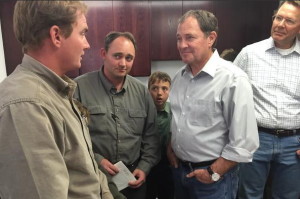 Utah Gov. Gary Herbert meets with Joseph Jessop and Sheldon Black, Jr. (L-R) at the Hildale City Hall. Both men lost wives and children in Monday's fatal flash flooding, Utah, Sept. 19, 2015 | Photo courtesy of the Office of the Governor St. George News