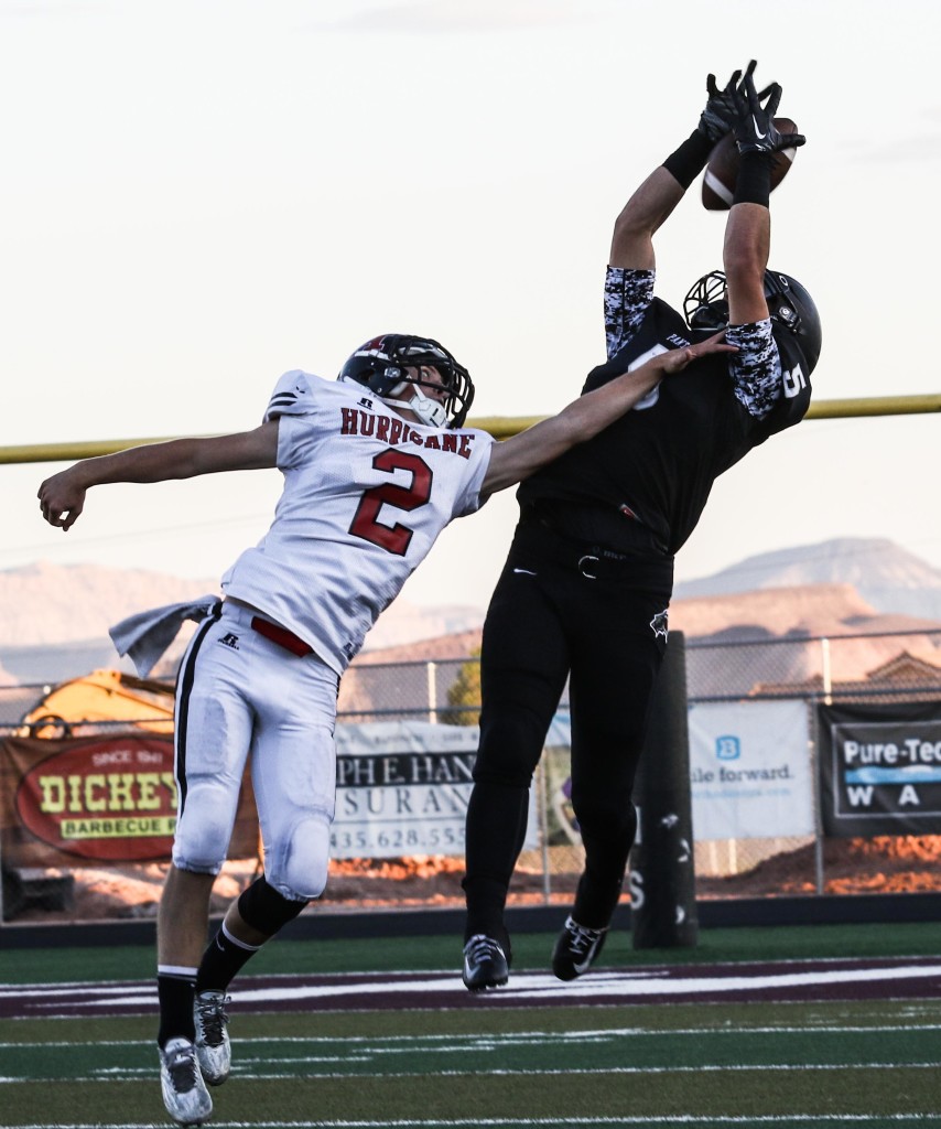 Pine View's Steve Bangerter (5) and Hurricane's Kyle Williams (2), Pine View vs. Hurricane, Football, St. George, Utah, Sept. 25, 2015, | Photo by Kevin Luthy, St. George News
