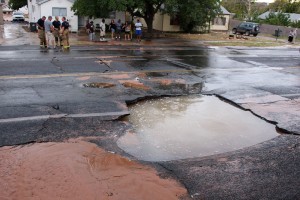 A water main break across from the city cemetery damaged the road Sunday night, St. George, Utah, Sept. 13, 2015 | Photo by Ric Wayman, St. George News