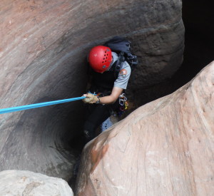 A canyoneer moving through Keyhole Canyon, Zion National Park, Utah, circa 2013 | Photo courtesy of Zion National Park, St. George News