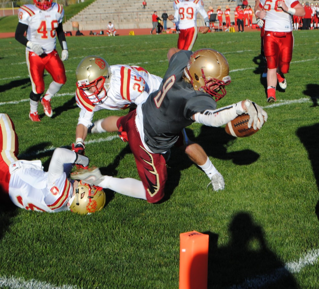 Drake Lewis stretches for a touchdown, Judge Memorial at Cedar, Cedar City, Utah, Oct. 30, 2015 | Photo by Jordan Abel, St. George News