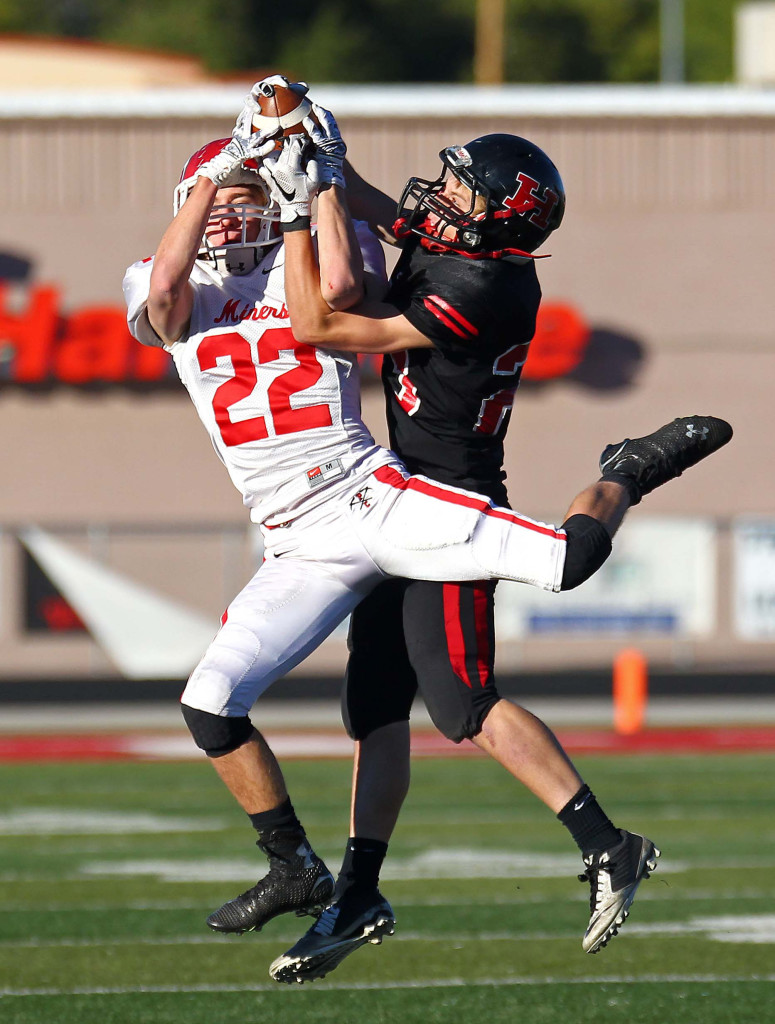 Hurricane's Kirt Mcdaniel (23) intercepts a pass, Hurricane vs. Park City, 3AA Football Playoffs, Utah, Oct. 30, 2015, | Photo by Robert Hoppie, ASPpix.com, St. George News