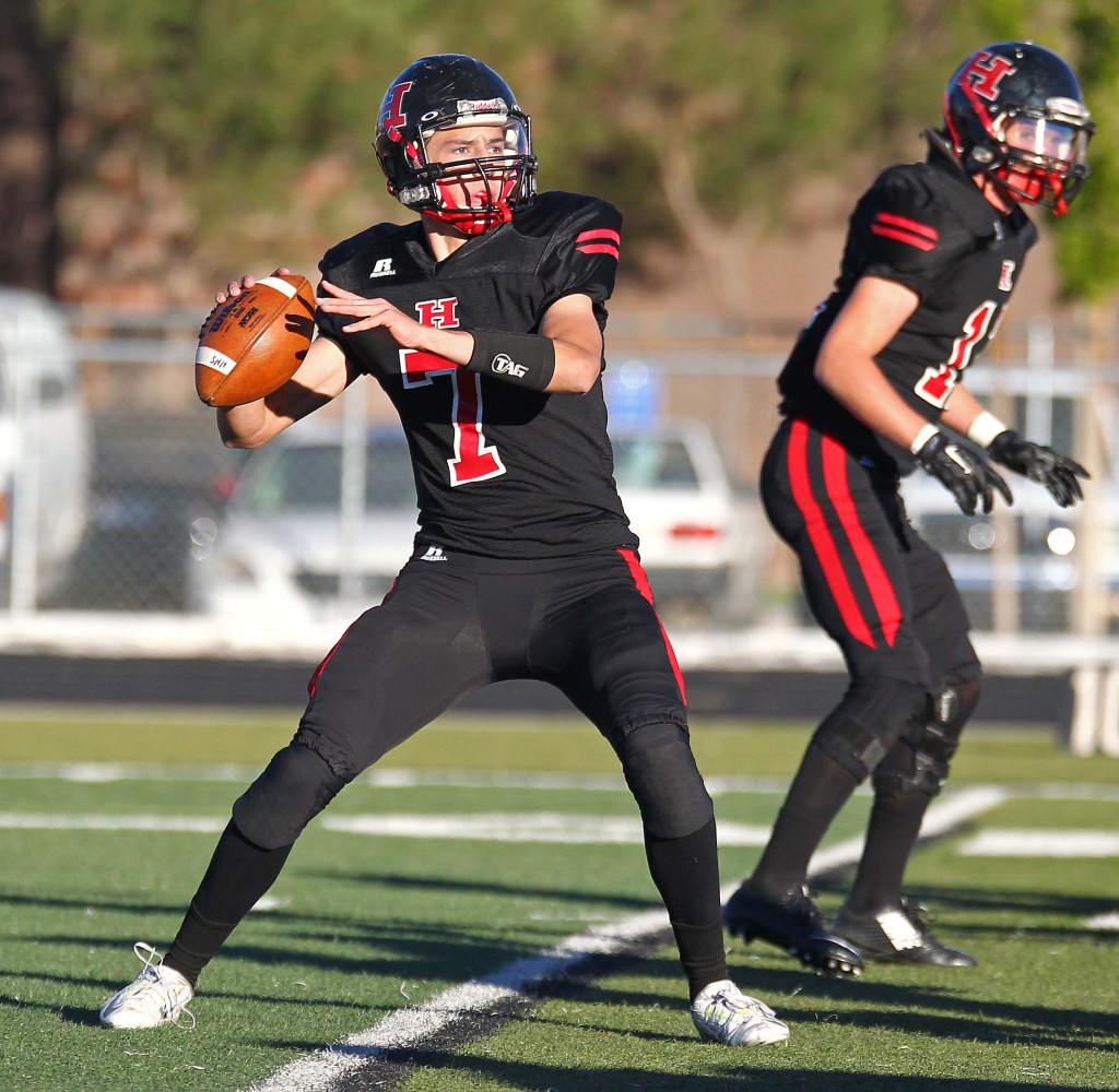 Hurricane's Josh Parker (7) looks for an open receiver, Hurricane vs. Park City, 3AA Football Playoffs, Utah, Oct. 30, 2015, | Photo by Robert Hoppie, ASPpix.com, St. George News