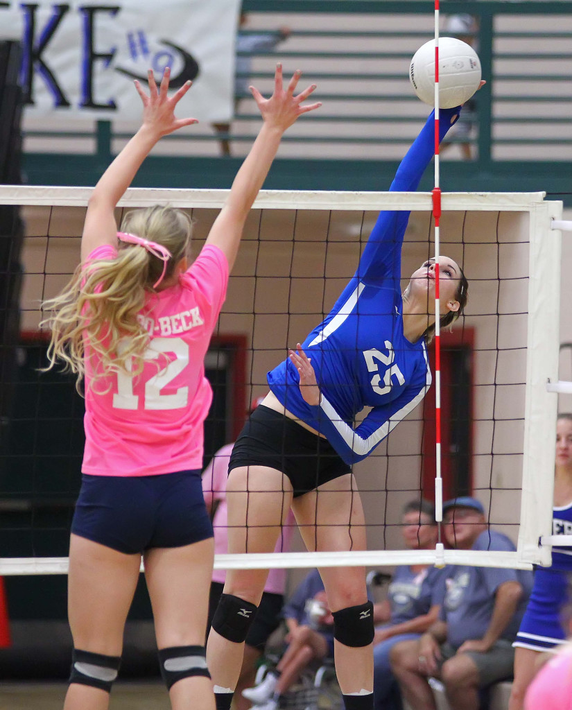 Dixie's  Katie Fisher (25) and Snow Canyon's  Shaylee Reed (12), Snow Canyon vs. Dixie, Volleyball, St. George, Utah, Oct. 22, 2015, | Photo by Robert Hoppie, ASPpix.com, St. George News