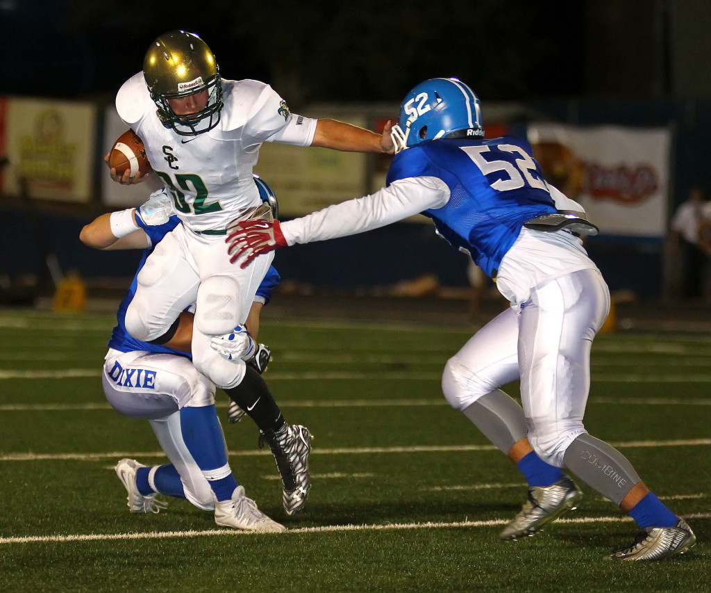 Dixie's Keanu Faumuina (52) makes a tackles in this file photo from Dixie vs. Snow Canyon, Football, St. George, Utah, Oct. 1, 2015, | Photo by Robert Hoppie, ASPpix.com, St. George News