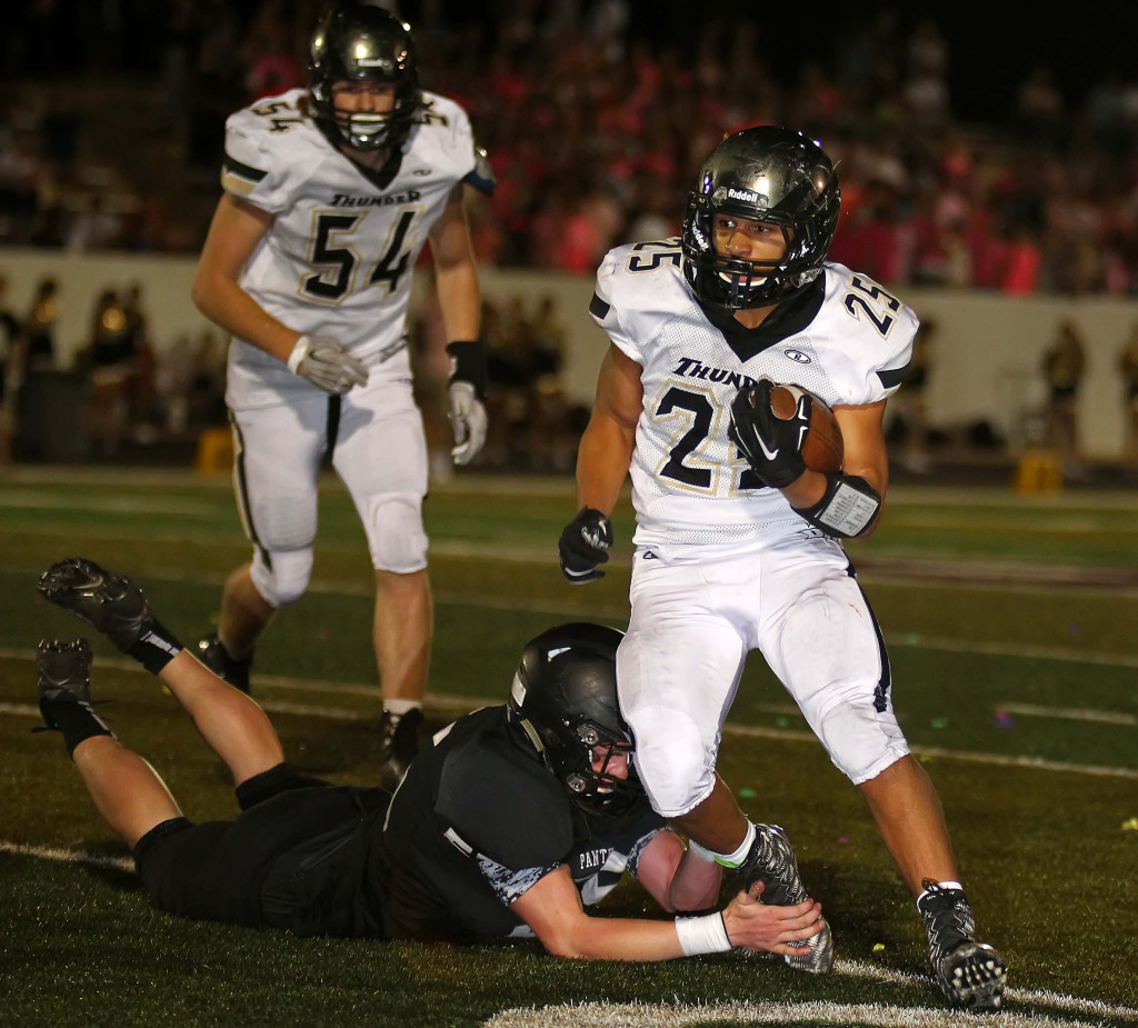 Marco Jordan (25) finds some running room for Desert Hills, Pine View vs. Desert Hills, Football, St. George, Utah, Oct. 2, 2015, | Photo by Robert Hoppie, ASPpix.com, St. George News