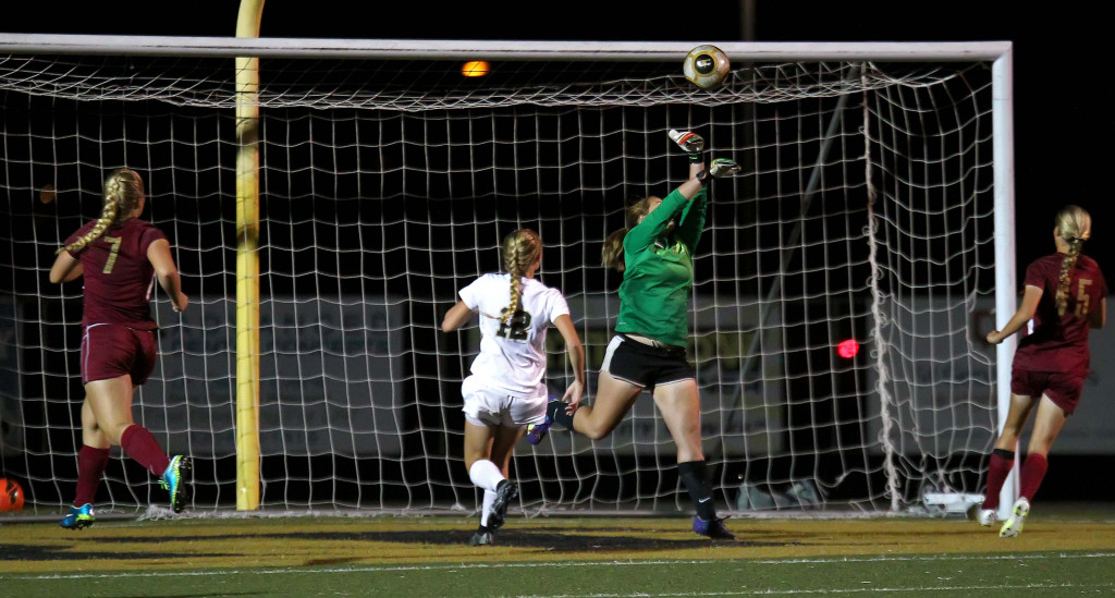 Cedar goalkeeper Megan Giddings just misses a ball that finds the net for a Desert Hills second half goal, Cedar vs. Desert Hills, Girls Soccer, St. George, Utah, Oct. 6, 2015, | Photo by Robert Hoppie, ASPpix.com, St. George News