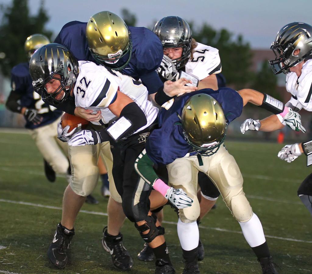 Zak Fuchs (32) carries the ball for the Thunder, Snow Canyon vs. Desert Hills, Football, St. George, Utah, Oct. 8, 2015, | Photo by Robert Hoppie, ASPpix.com, St. George News