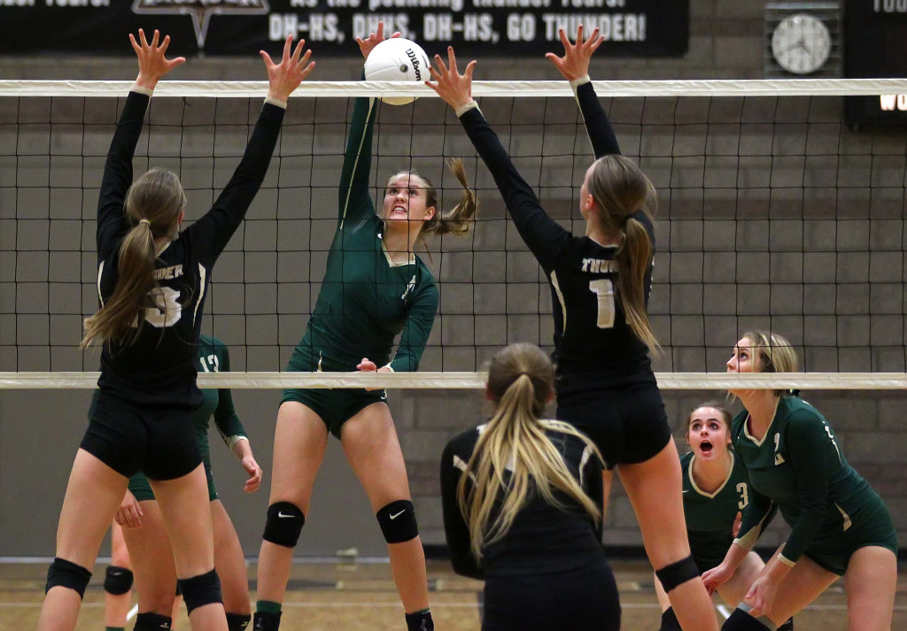 Camryn Johnson hits for Snow Canyon, Desert Hills vs. Snow Canyon, Volleyball, St. George, Utah, Oct. 13, 2015, | Photo by Robert Hoppie, ASPpix.com, St. George News